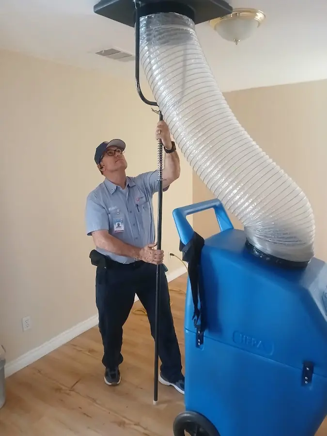 HVAC Installation technician using HEPA equipment in Rayne
